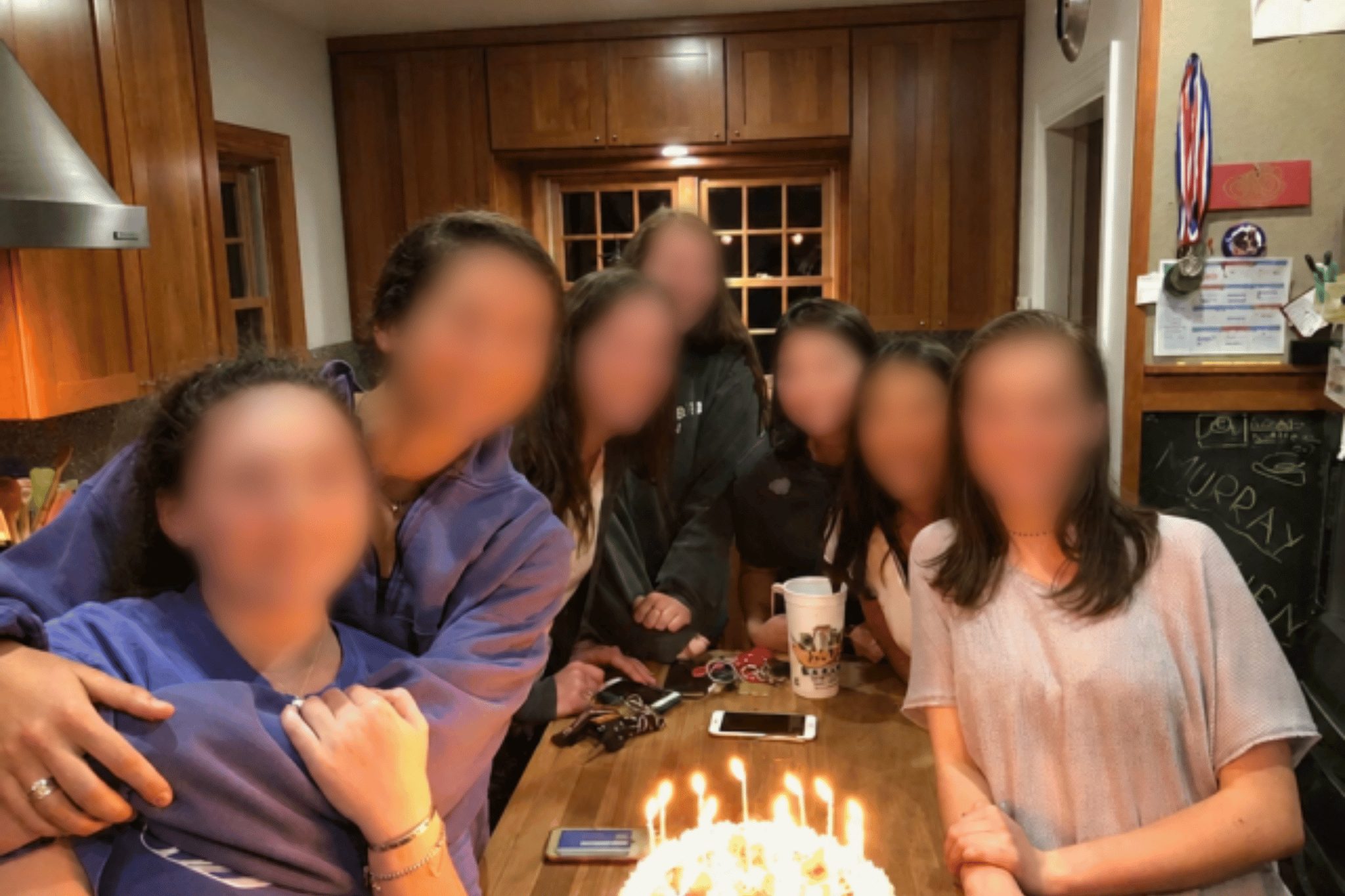 Family celebration in the kitchen at 6826 Lakeshore Drive, Lakewood