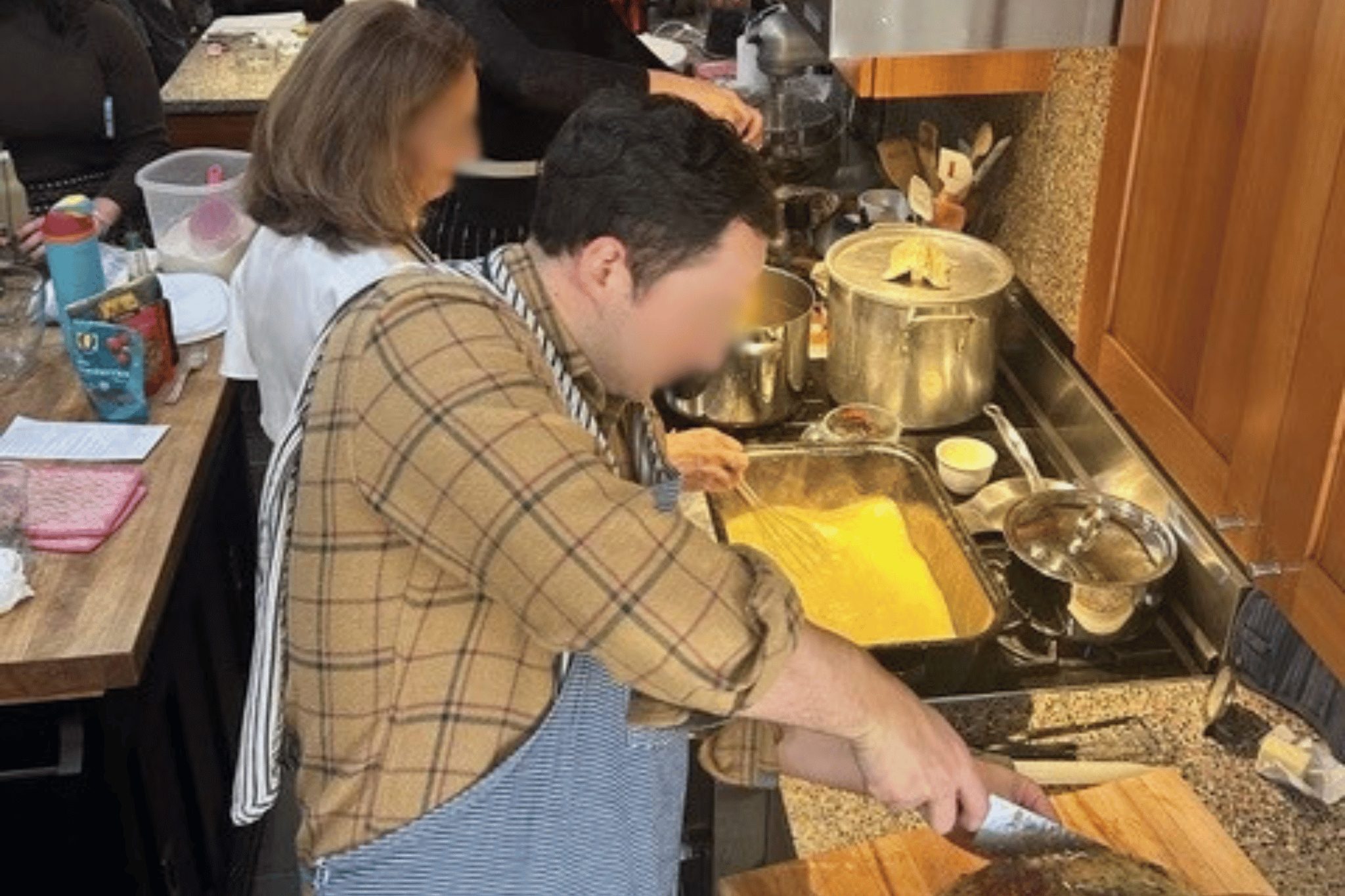 Family gathered in the kitchen at 6826 Lakeshore Drive, Lakewood